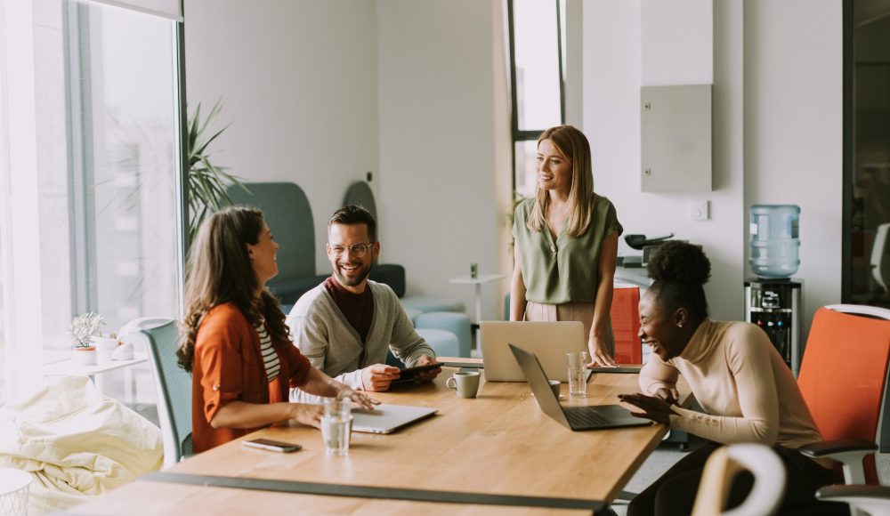 Young multiethnic startup team working at the modern office